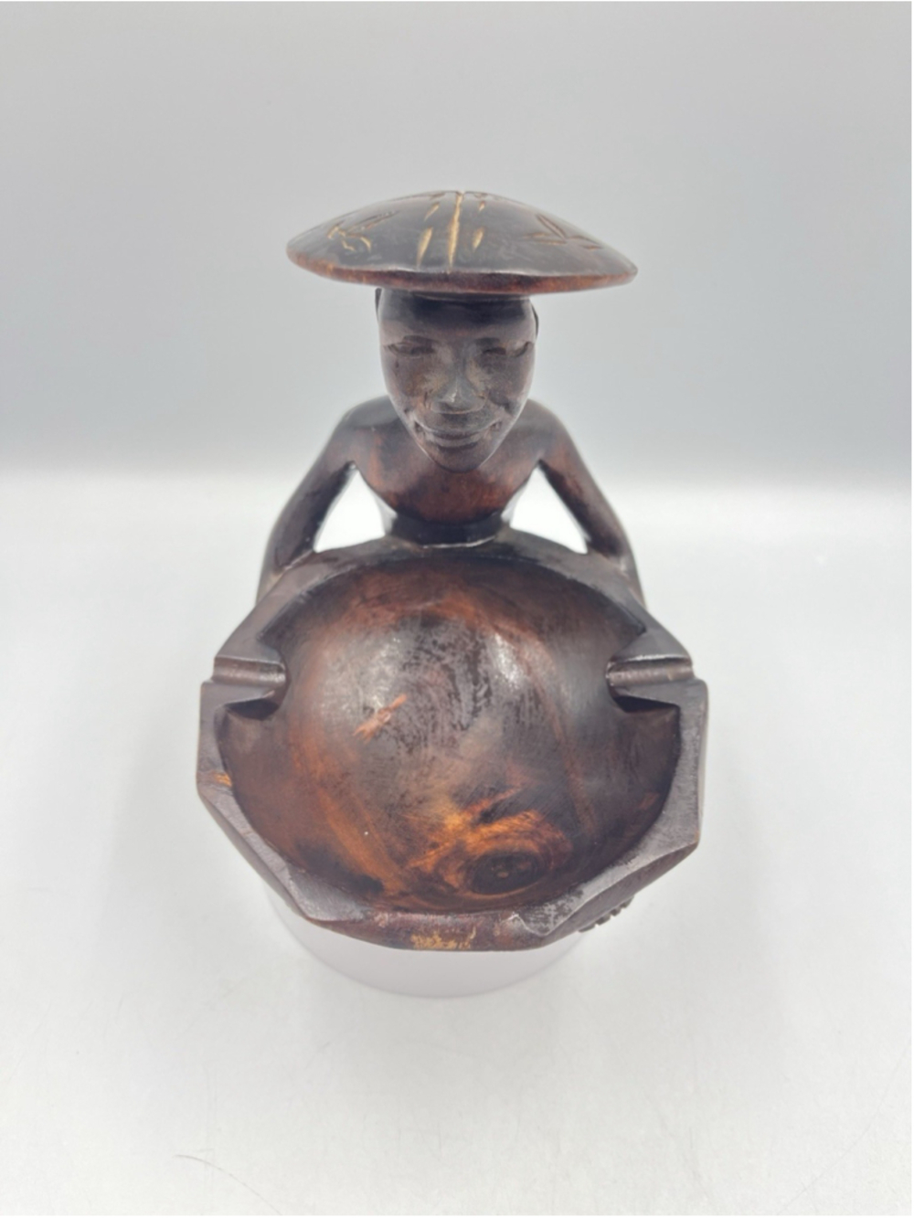 Vintage hand carved wooden ashtray of asian man holding a wash bowl FOLK ART